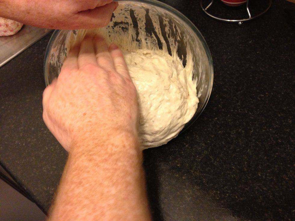 Tip the dough on to the oiled surface.