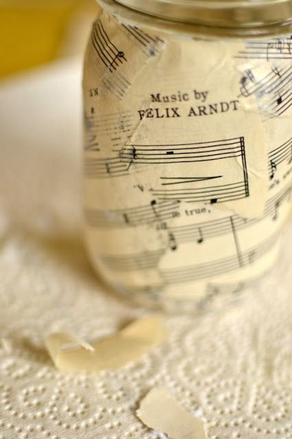 Tips: if you don't have news paper why not use music paper it looks nice in this pic:)). If you want the paper to stay on and not peel off put an other layer of glue on it before leaving it to dry:)