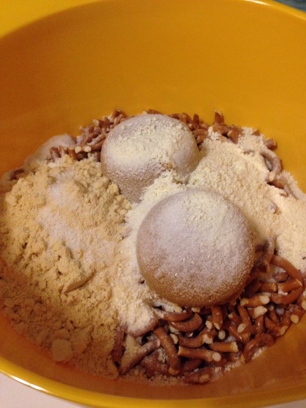 To a large bowl, combine crushed pretzels, brown sugar, white sugar, powdered milk, malted milk powder, and salt and stir until combined