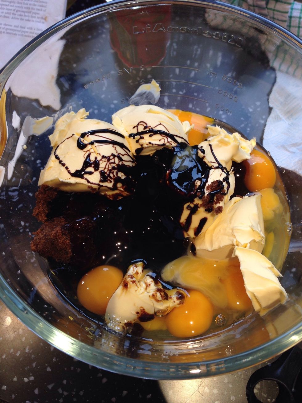 To a large mixing bowel add: Flour, spices, margarine, sugar, eggs, almonds, treacle, lemon and orange zest Preheat the oven to 140\u00b0C (275\u00b0F/Gas 1)