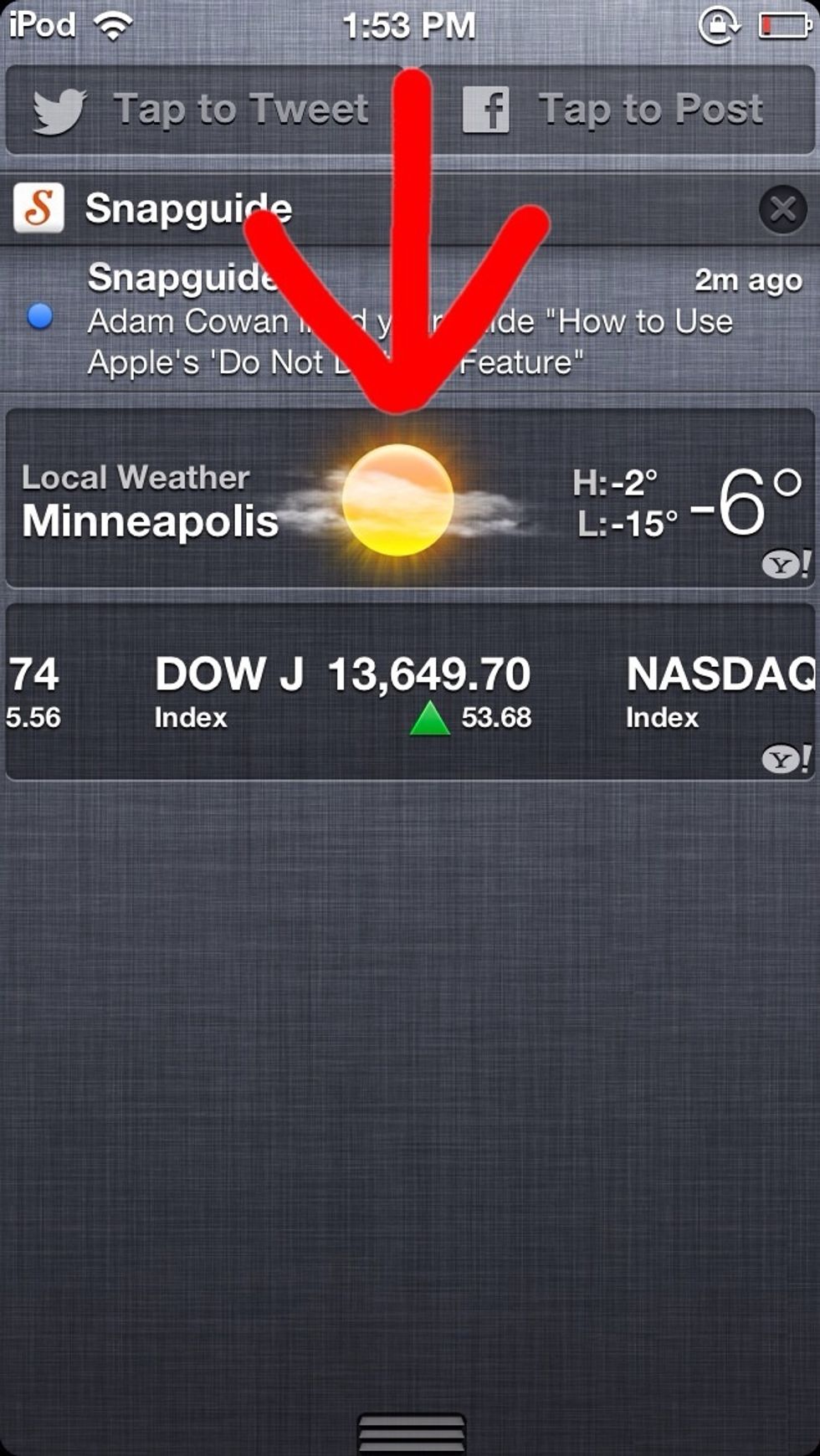 To access notification center swipe down from the top of your screen. (Follow the direction of the arrow). You will see the stock market widget which I hate.