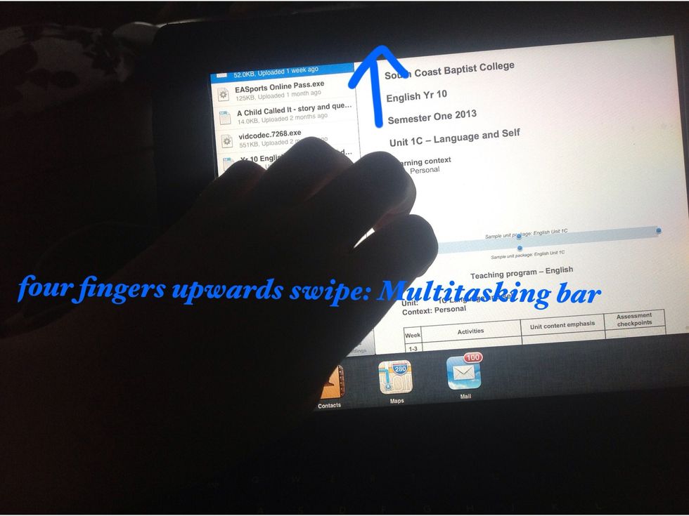 To access the multitasking bar: swipe upwards with four or five fingers