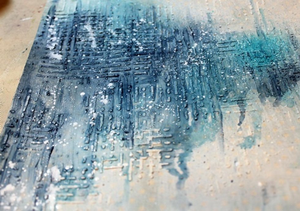 To add a bit of a winter look I added a bit of gesso splatters across my layout.