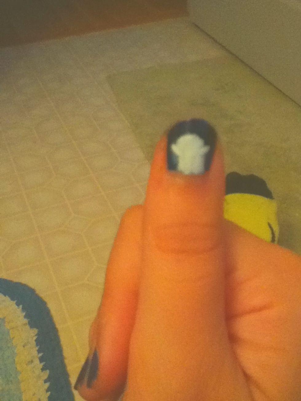 To add a little character, I added "scary" arms. Also, I added another coat to the body with the white polish so that it would be whiter.