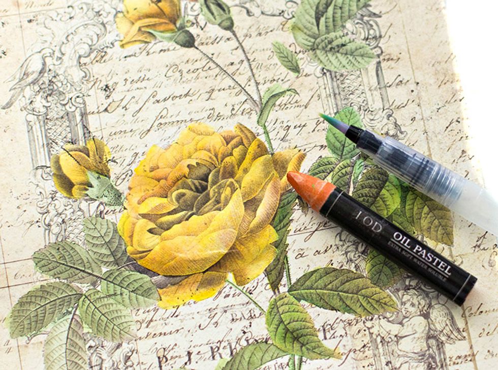 To add a touch more depth to the flowers I added one more shade, Orange. Scribble it onto the craft mat and use the water brush to pick the color up and add to the shadow areas.