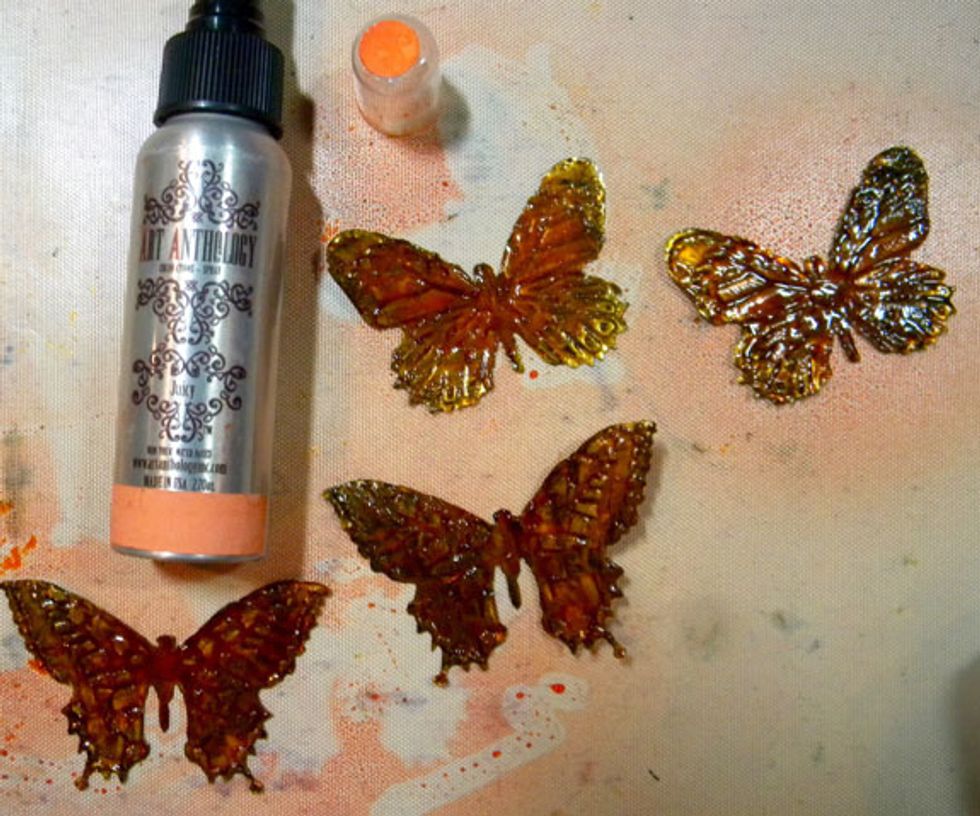 To add some orange to the butterflies, I sprayed them with Juicy Colorations Spray and let them dry completely.
