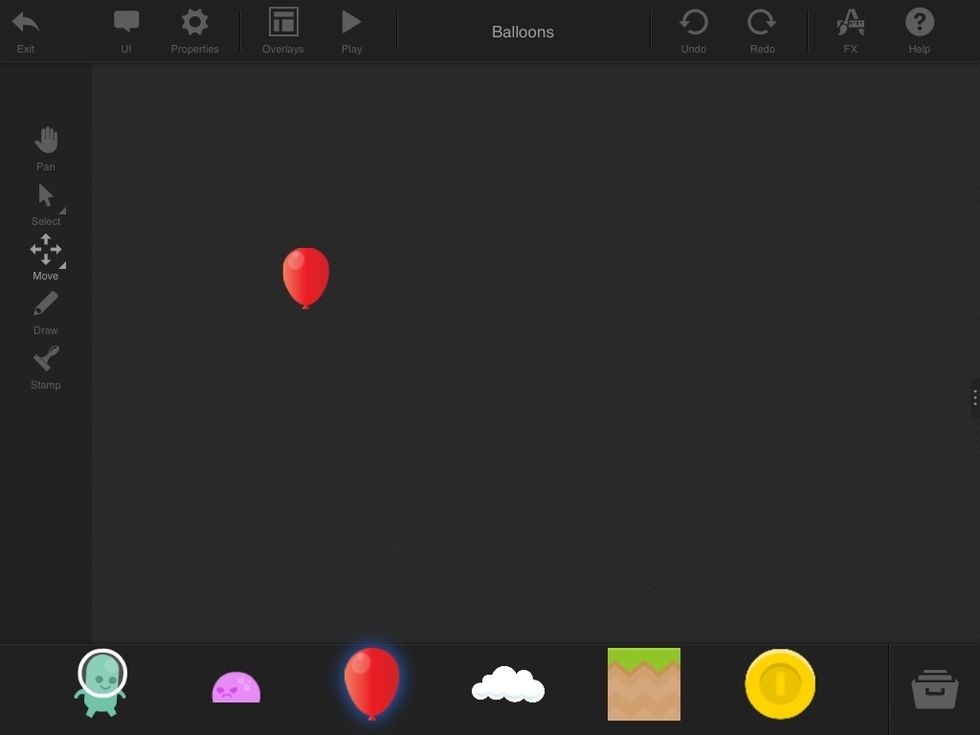 To add the balloon to the game, just drag it from the bottom to the empty space above (this is your game window).