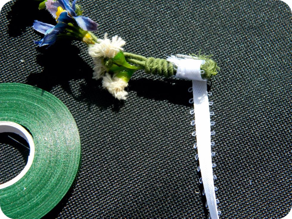 To add the ribbon, tie it around the end & wrap it around. Either secure with floral tape or another knot.