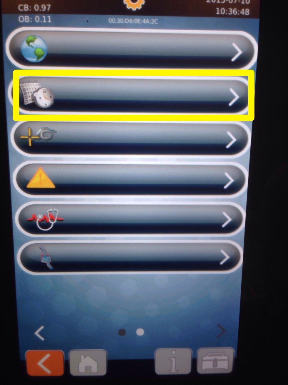 To adjust the date and time on your oven, select this icon.
