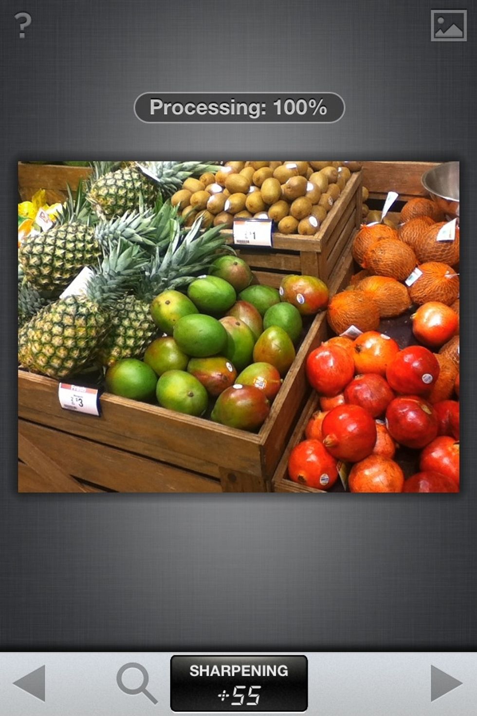 To adjust the sharpening, hold you finger on the photo and move it Left/Right to Decrease/Increase the sharpening. I chose 55. Tap the GREY ARROW on the RIGHT to commit the changes. It will PROCESS.
