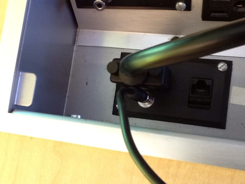 To allow sound to be played through the monitors, plug the thin black cable that is attached to the VGA cable into the audio port on the sandbox and the audio port on the laptop.