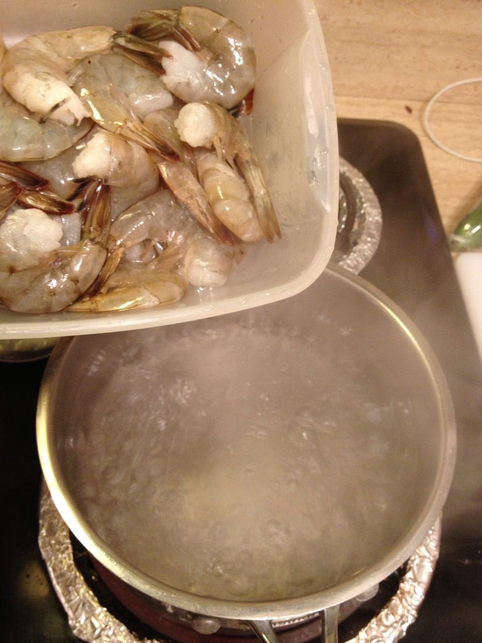 To another pot of boiling water, add your shrimp.