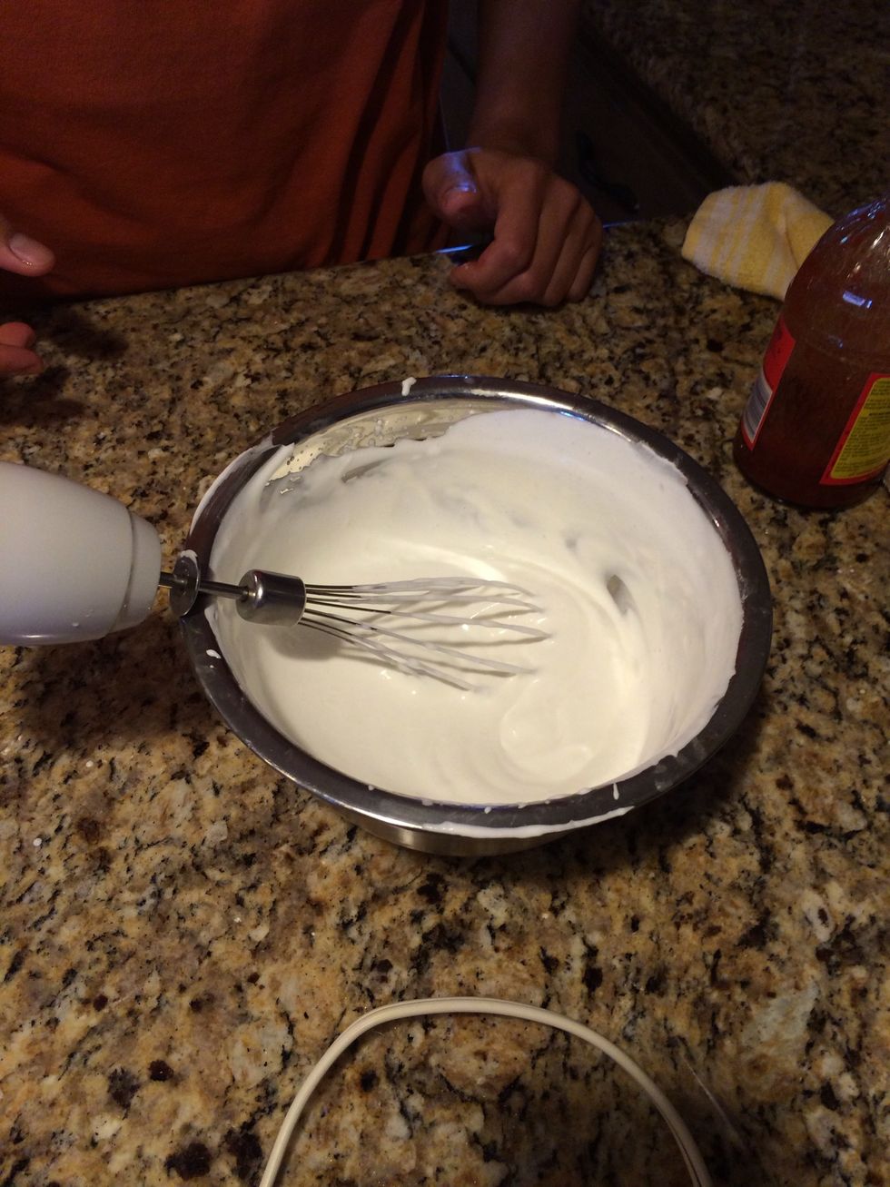 To bowl, add heavy whipped cream and whisk with hand mixer.