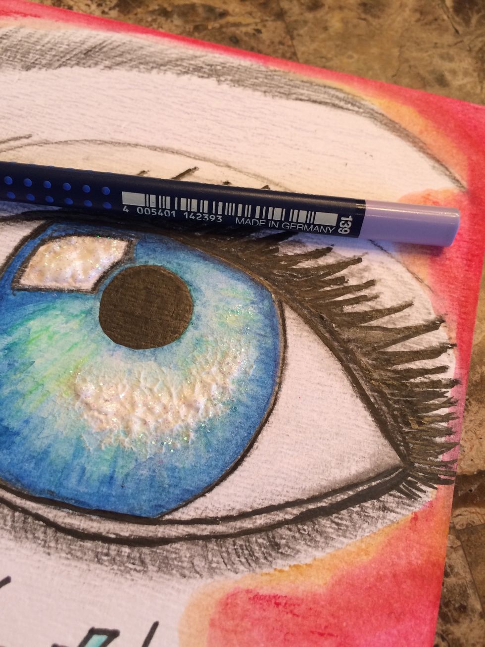 To bring down the brightness of my white background, I used my Art Grip (R) Aquarelle Watercolor Pencil #134 lightly over the white spaces and lightly painted with water.