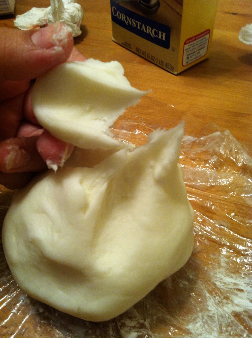 To check if its done pull a piece off, if its smooth and forms a taffy like pull its done.