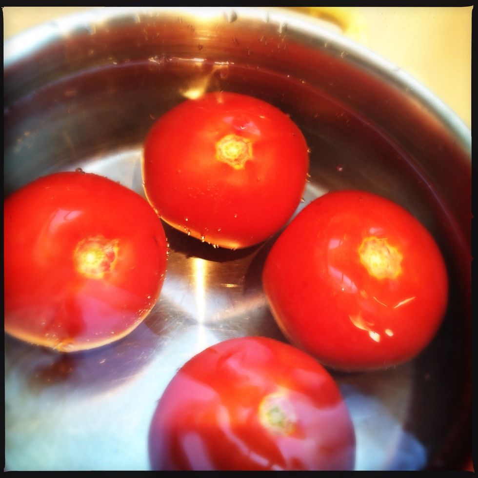 To clean > Put the tomatoes in cold water. Let them soak for at least 10 minutes then dry them off and set them on a slicing board.