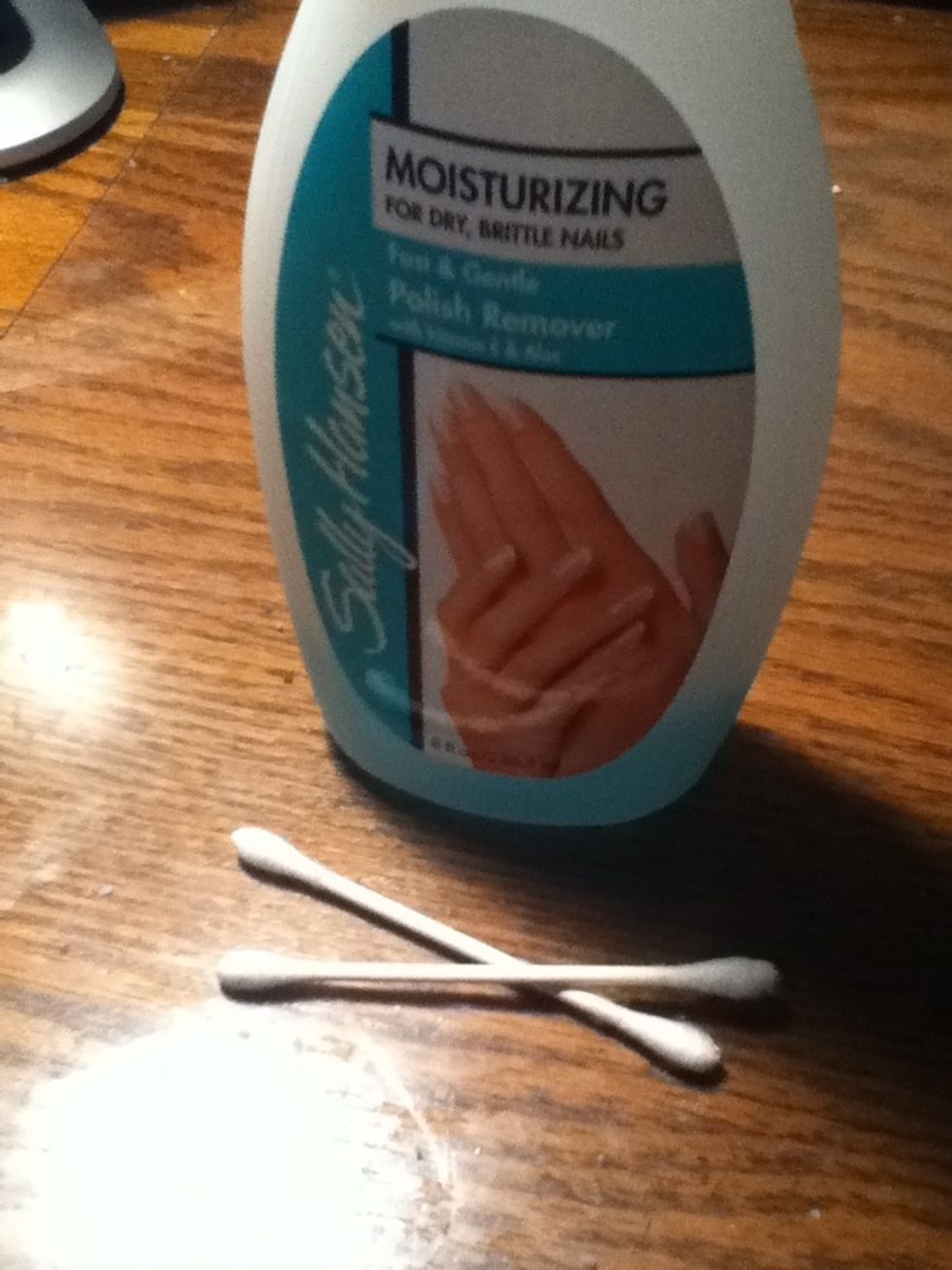 To clean up the skin surrounding the nails, dip the end of a Q-tip into nail polish remover. Then gently rub the Q-tip over the areas of skin with polish to remove it.
