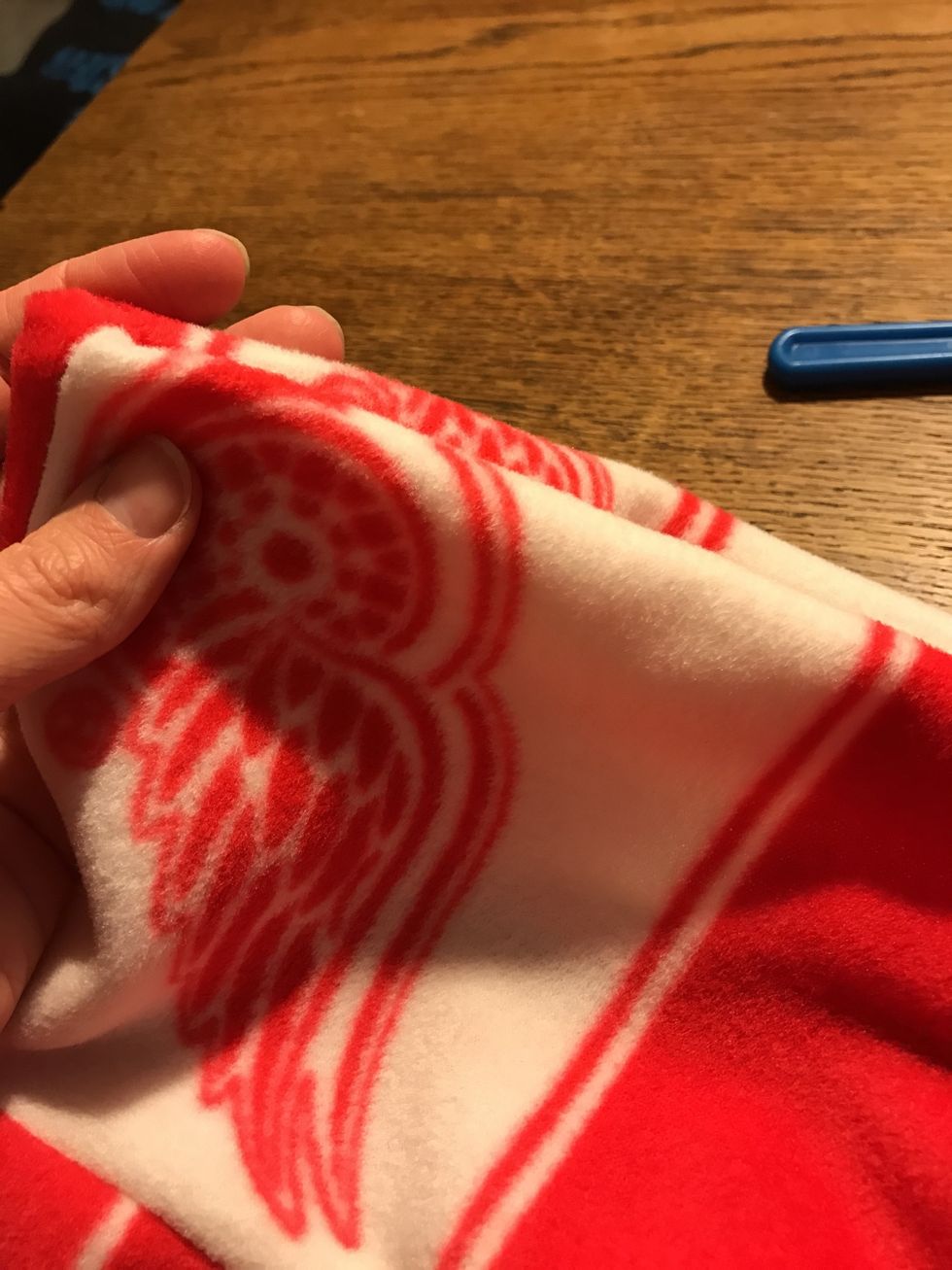 To close the hole- fold the cut edges in and pin.