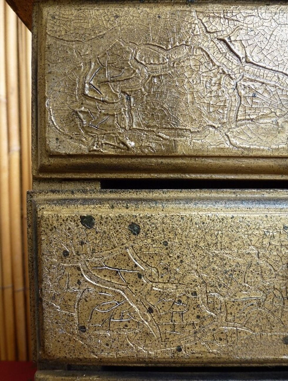 To complete attach the cast figure heads to front of drawers with a strong clear drying glue, these will be use as drawer pulls.Apply a light mist of Vintage coal this gives it the speckled look