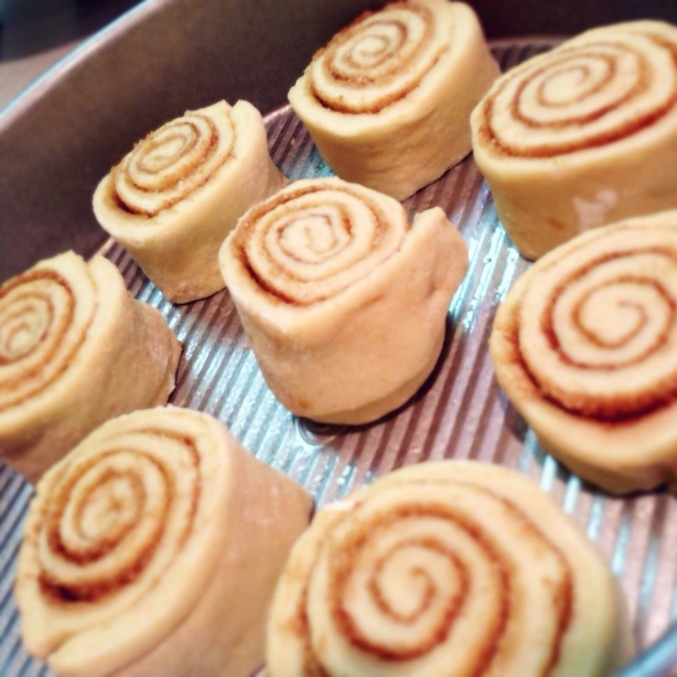 To conceal the ends of each half of the dough, place cutside down.