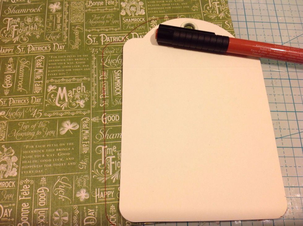 To cover my tags I traced onto my paper keeping it on the edge of the paper. This way I could get both sides cut from one sheet of paper.
