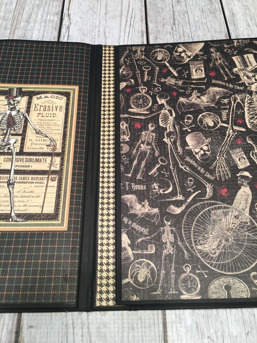 To cover the 1/2" black hinge from inserting the pages into the 1" sections, cut a strip of patterned paper and attach into the album to cover the hinges.