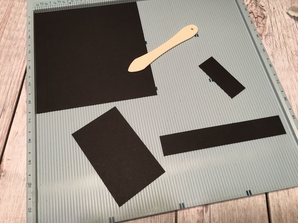 To create a fun slider element for the front cover of the album, cut from card stock 1 @ 6" x 6 1/2, score 6" side at 1/2" & 3 1/4", cut 1  @2 1/2" x 4", 1 @ 6"x 1", score 6" side @ 1/2" & 5 1/2"