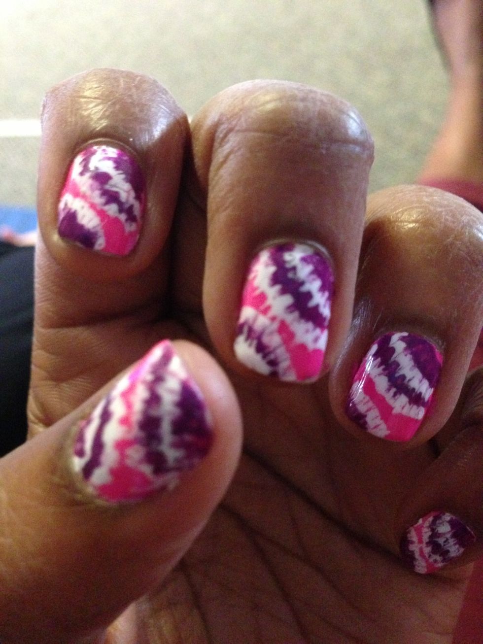 To create the bottom part, use the first polish you used and take the straight pin and move up instead of down, the repeat until you get to the end of the nail.