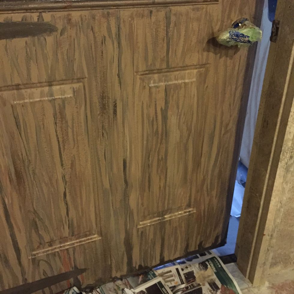 To create wood grain, loosely paint vertical lines with the darker and lighter colors, creating knots.