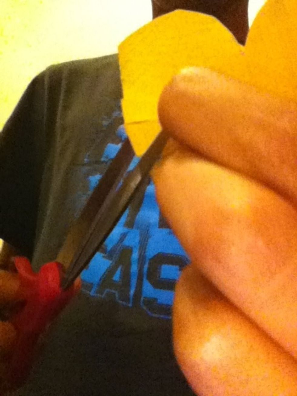 To cut the inside of the eye part, fold that part in half and cut a small hole on the side and open it back up, then cut the rest out.