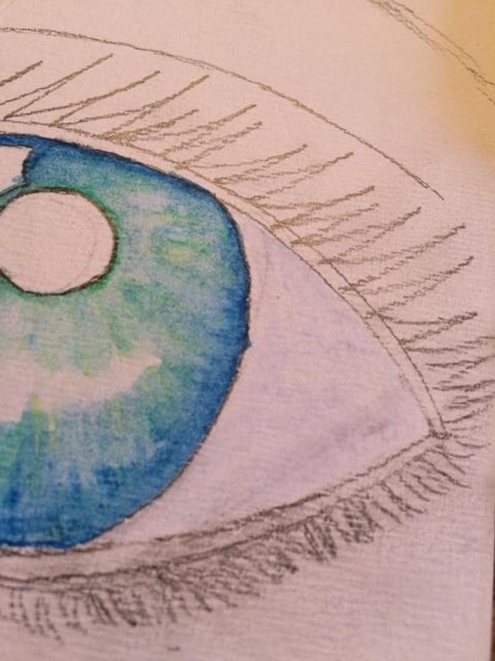 To darken the "whites" of the eyes, I used Art Grip (R) Aquarelle Watercolor Pencil #137