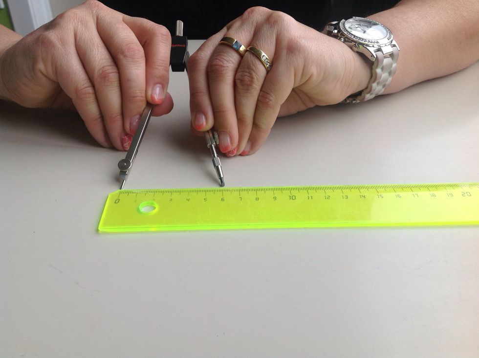 To do this you should take a ruler and set the radius of your compasses at 6 cm.