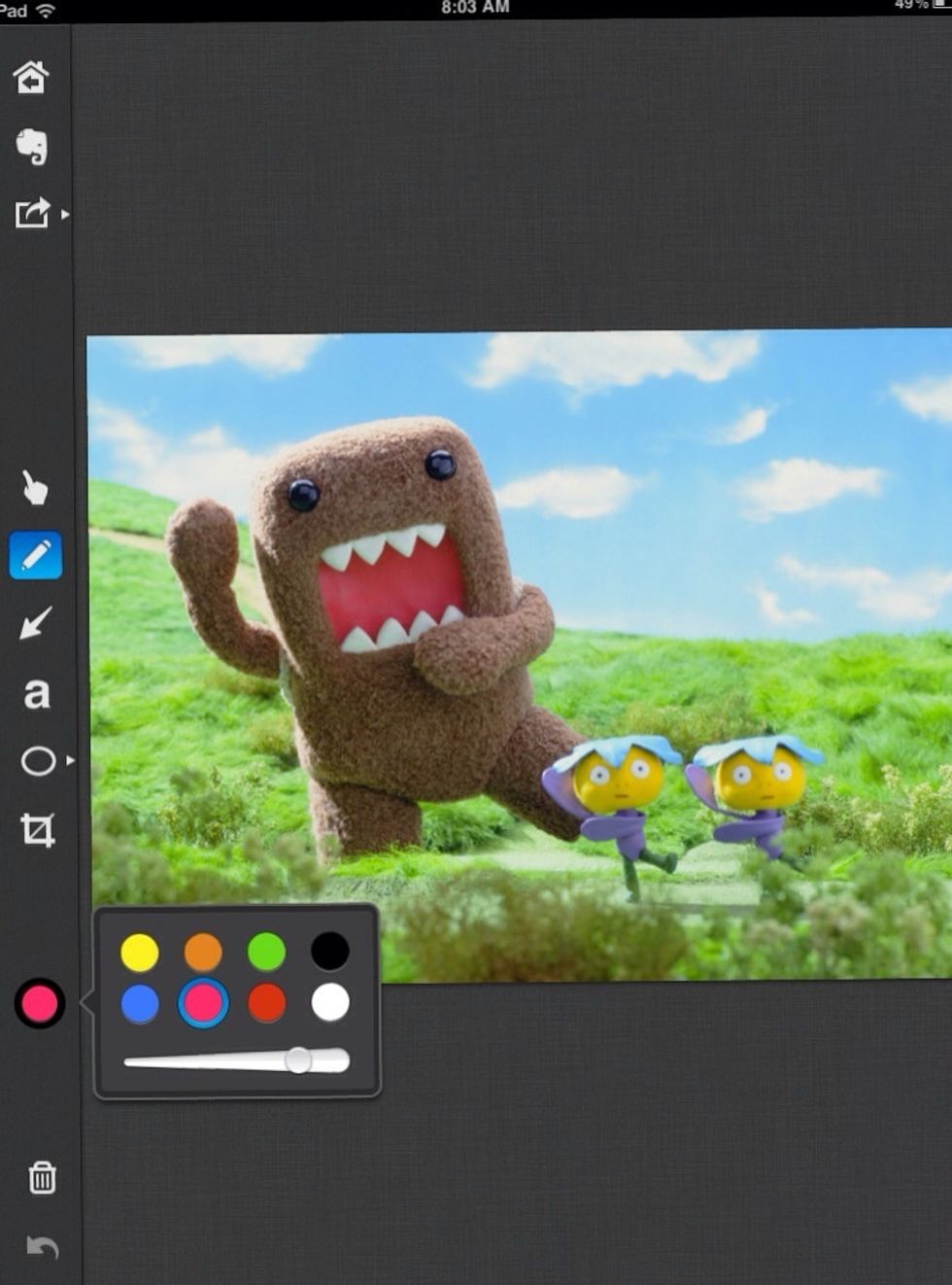 To draw on a photo, click on the circle with color on it. Select your color and draw.