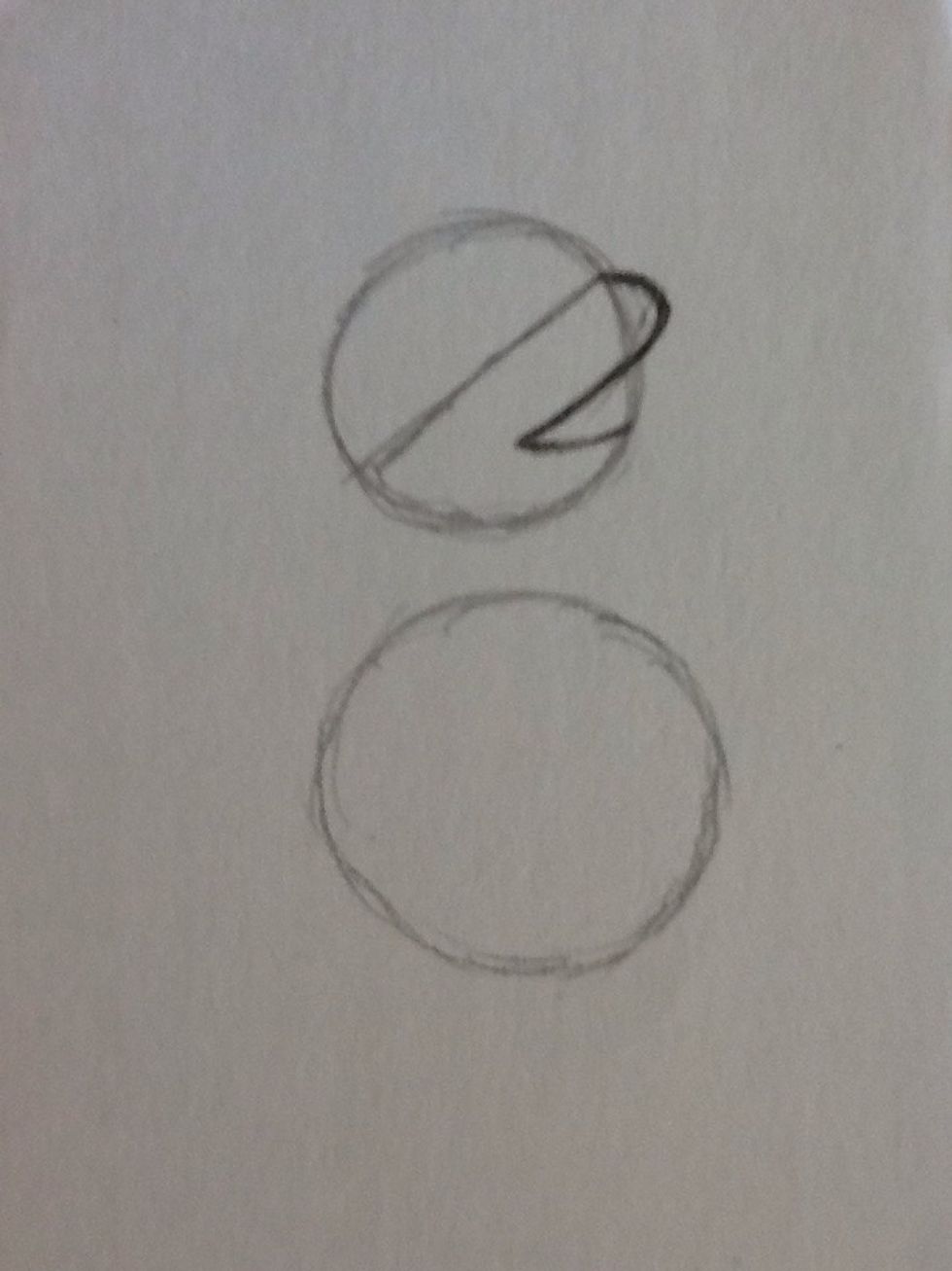 To draw the body draw a slightly bigger circle a below the first circle, make sure to leave space in between.