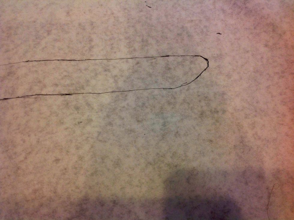 To draw the rear of the plane, first draw an upward curve similar to the one in the picture; then after draw a vertical line about 1.5 inches long. Next, draw a curve line to connect the upper line.