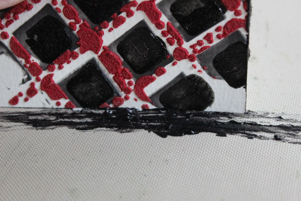To edge it I simply added some Black Leather Jacket to my Art Anthology craft mat. Then I ran the edges over the color.