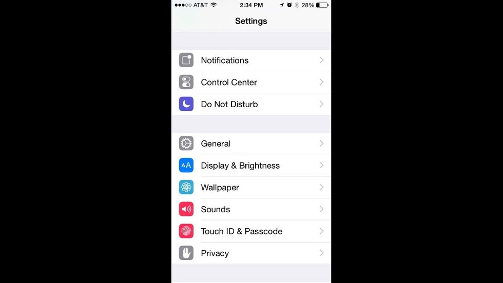 To enable the Grayscale feature go into settings and tap on the option General.