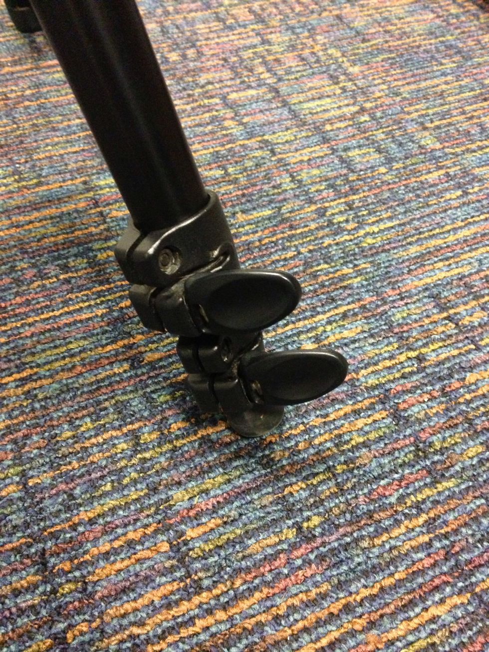 To extend the legs, flip out the locks and pull out the legs to full length. Push each lock back down after extending the leg. Note, some tripods have knobs instead of latches used to extend the leg.