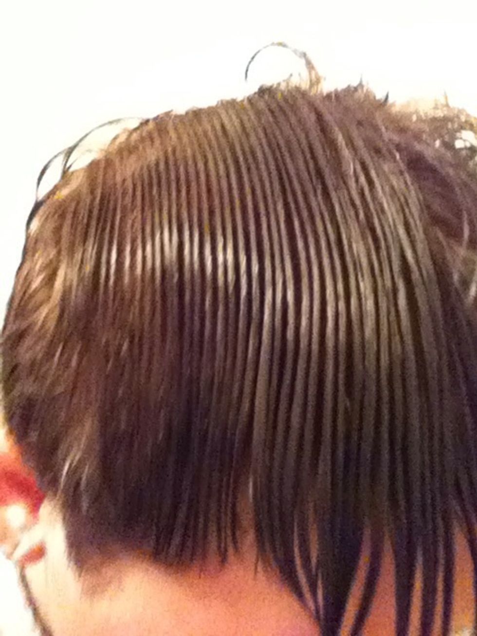 To find your hairs natural part comb the hair forward. When combed forward the hairs should part in at least one spot on the head. Parting from this natural part makes the process much easier.