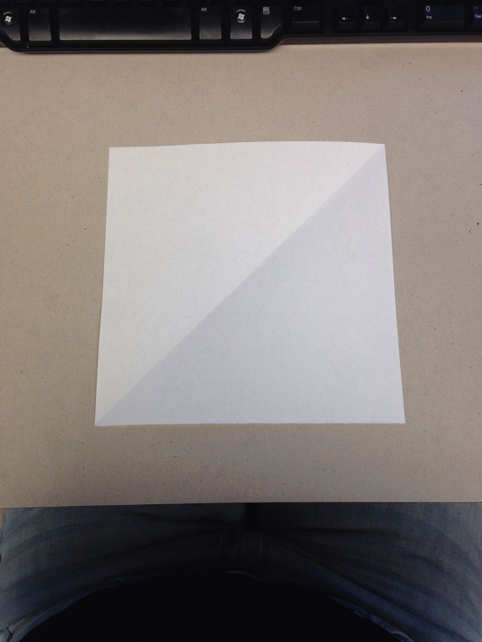 To finish making the square, cut or rip off the small rectangle, forming a square.