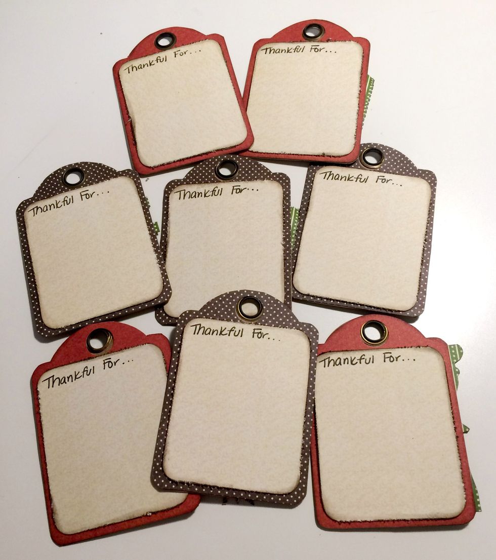 To finish the back of the tags, use a black journal pen to write "Thankful For" on the cream paper.
