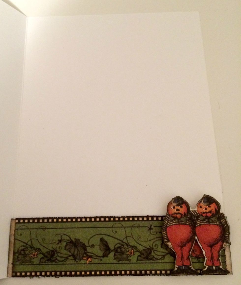 To finish the inside of the card, adhere the 5" pumpkin border to the bottom of the inside of the card. Foam square Tweedledee & Tweedledum to the right hand side of border.