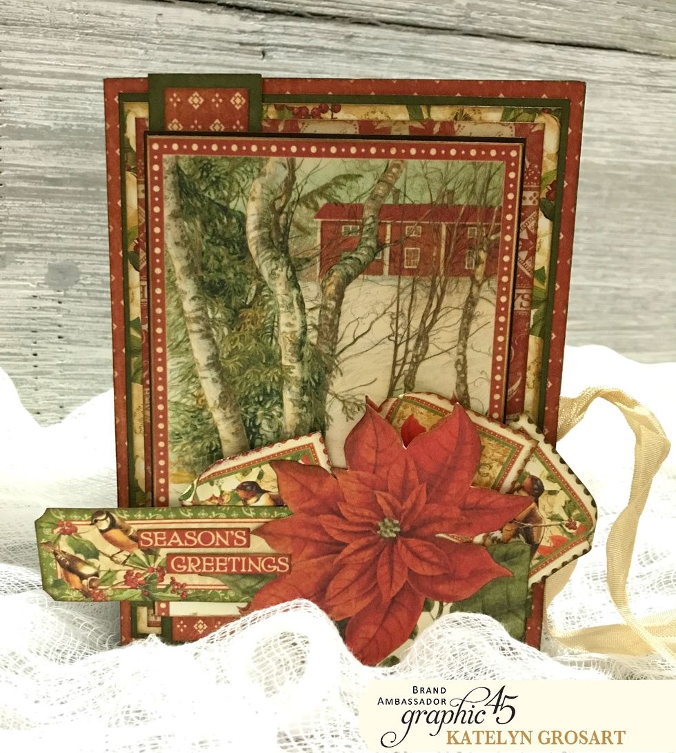 To finish your Season's Greetings mantle card, tie a bow on the right hand side of your card. Your Season's Greeting Card is now complete!