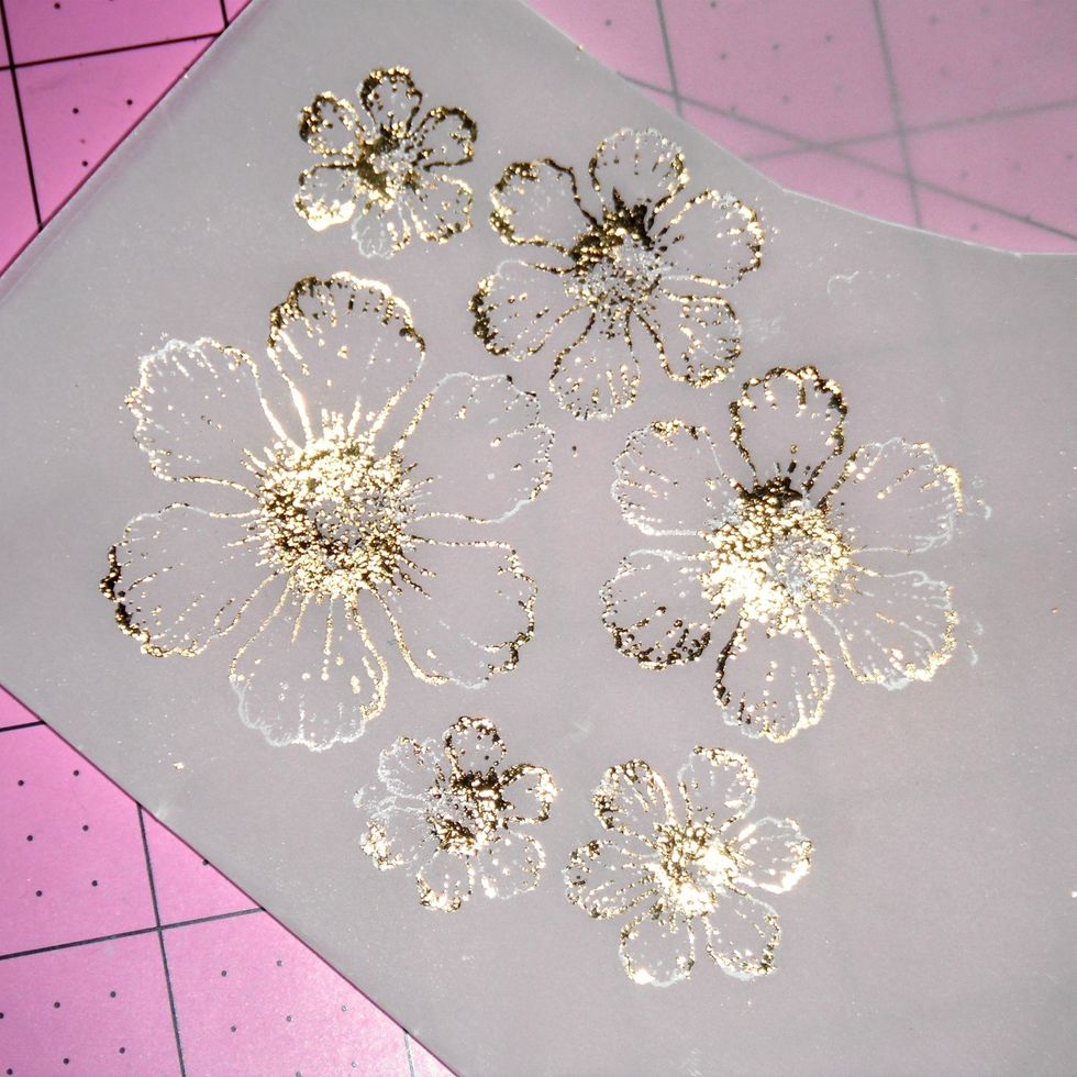 To foil the image even more continue heating sections and adding Decofoil to it, burnishing it well, until the image is fully covered.