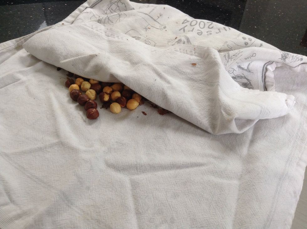 To get the skin off put them on a tea-towel and gently rub