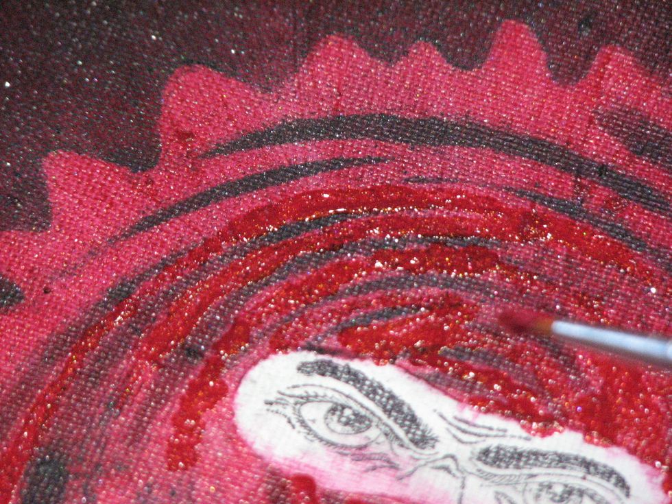 To give the canvas texture and dimension I went back and painted in between the lines of the stenciled design.
