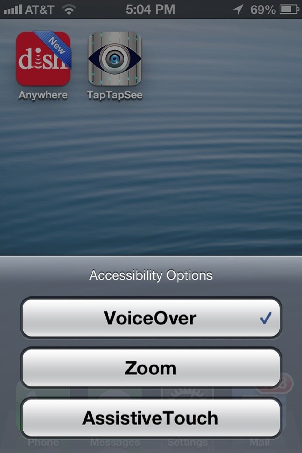 To hear the voice you must turn VoiceOver on on your iPhone. I set it so I can turn VoiceOver on and off by triple tapping my home button.