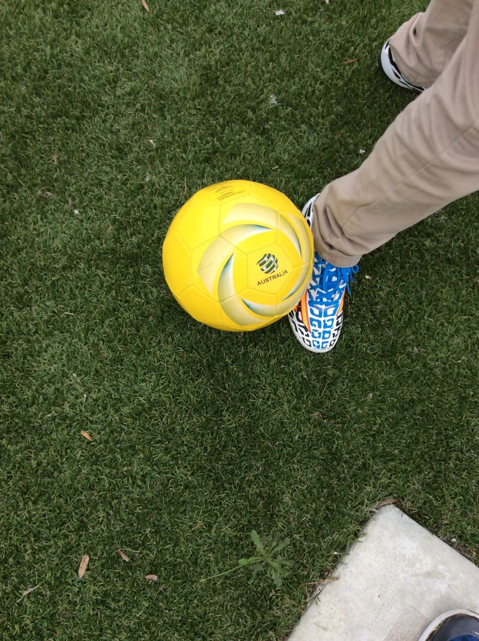 To hook the ball you need to put the outside of your foot under the soccer ball. To slice the ball you need to put the inside of your foot under the ball.