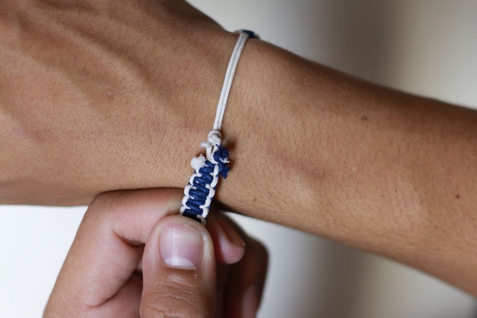 To keep it from falling off in your daily routine. Pull the braid towards the knot to kinda seal in the knot so it won't fall off. Like so in the picture.