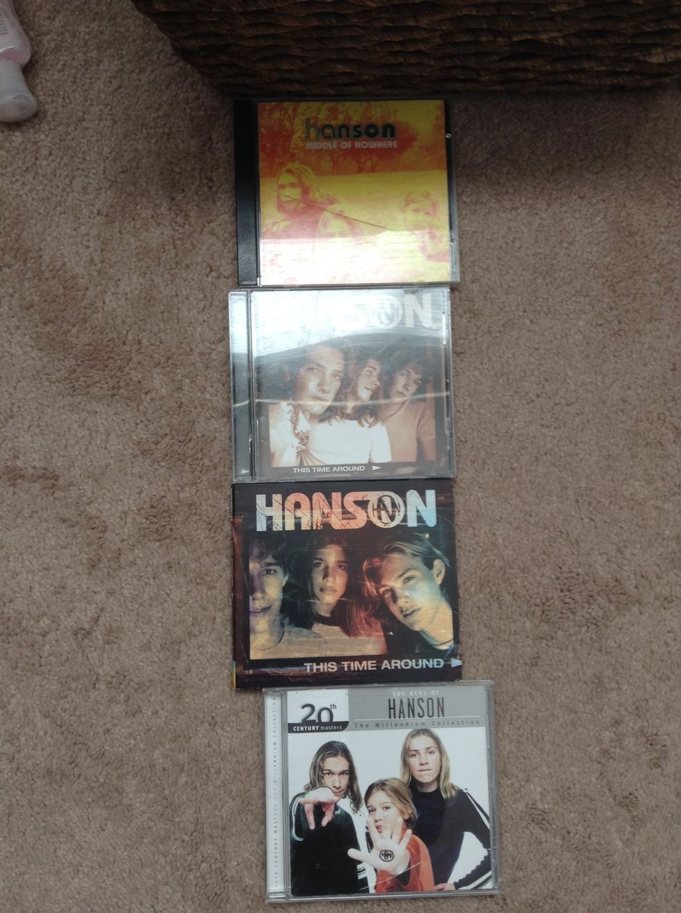 To like a band or an artist, you have to know their music, so go out and get CDs or buy some of their songs on your MP3 player. You could always just go on YouTube and look at their music as well!